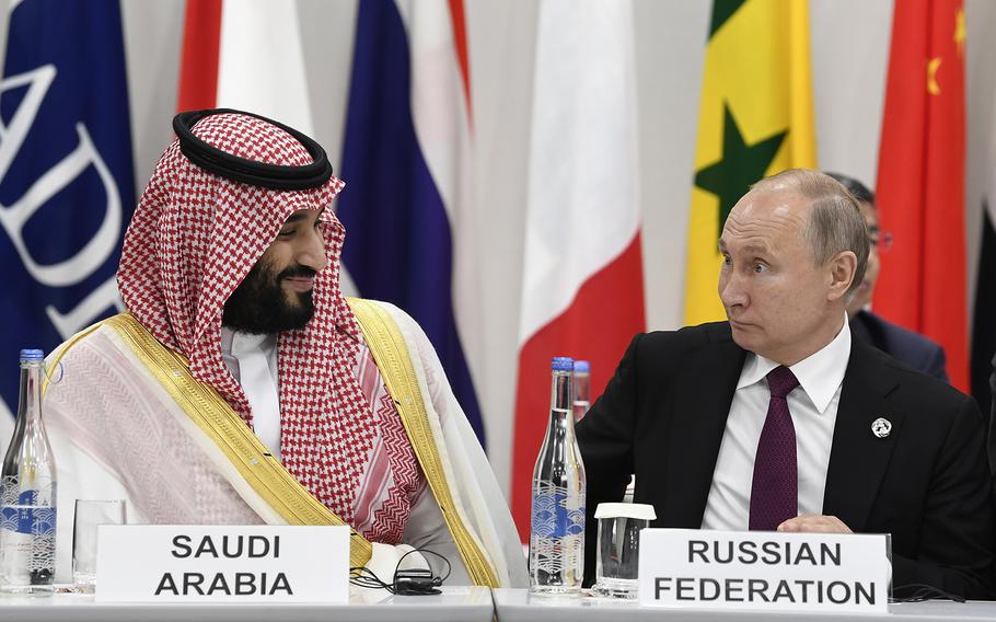 Saudi Arabia’s Crown Prince Mohammed bin Salman, left, talks with Russian President Vladimir Putin, right, during the G-20 summit event on the Digital Economy in Osaka, Japan, on June 28, 2019. Putin arrived in Saudi Arabia for a meeting with Mohammed bin Salman on Wednesday, Dec. 6, 2023, part of a rare foreign trip to strengthen partnerships in the Gulf.