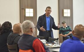 Army Emergency Relief CEO Tony Grinston speaks with military retirees during a luncheon at Clay Kaserne in Wiesbaden, Germany, on Sept. 13, 2024. Grinston visited Army communities in Italy and Germany last week to raise awareness of the agency's assistance programs.