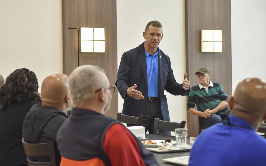 CEO of Army Emergency Relief Tony Grinston speaks with military retirees in Wiesbaden, Germany