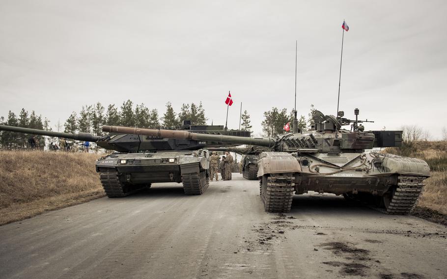 Tanks park on a road during a display.