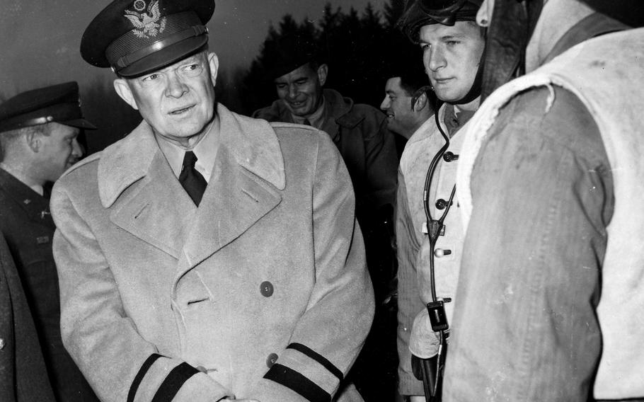 U.S. Army Gen. Dwight D. Eisenhower listens to soldiers in Germany in 1951.