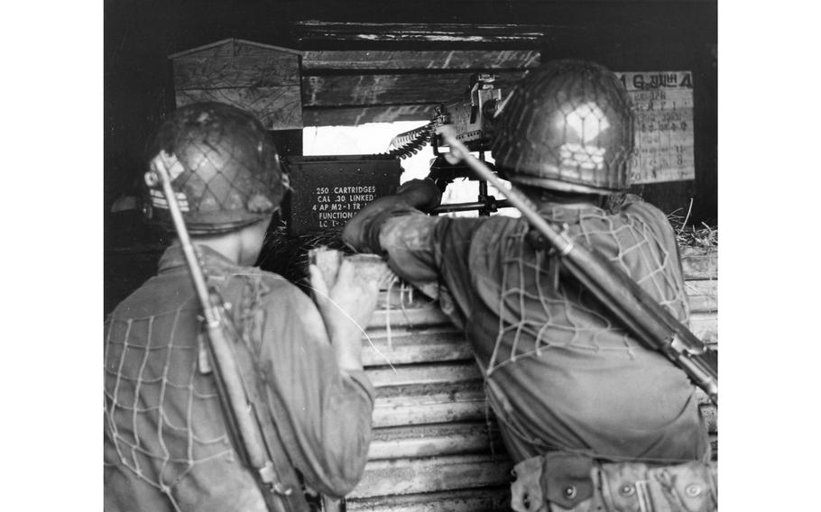 Soldiers of the 1st Republic of Korea Division keep their machine gun ready for any threats against their outpost on the Demilitarized Zone.