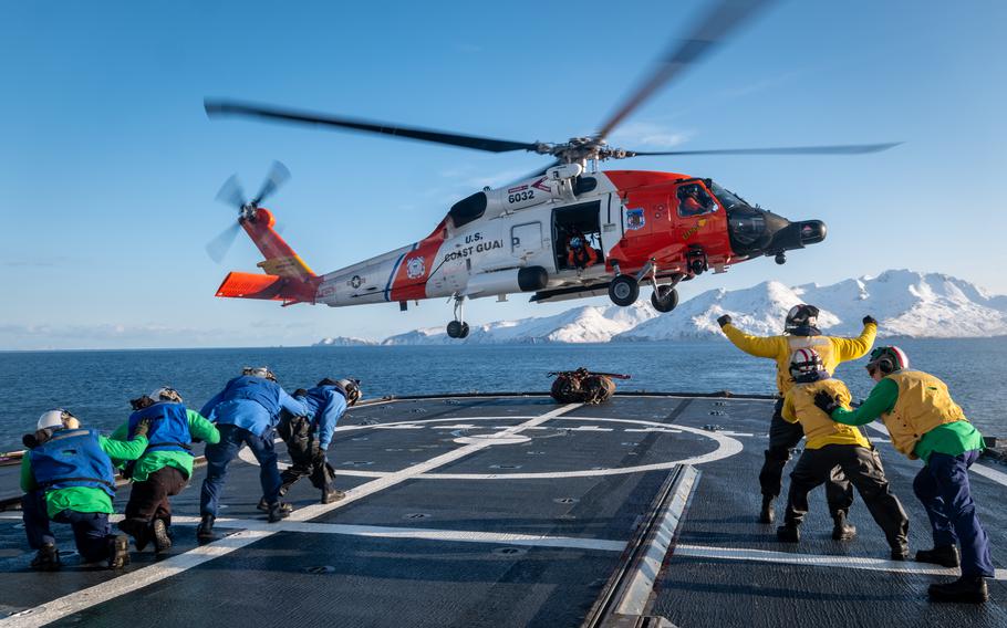 Crew members aboard the Coast Guard Cutter Alex Haley conduct helicopter operations in the Bering Sea.