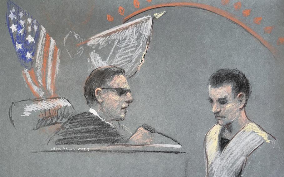 A courtroom sketch of a man appearing before a judge with a U.S. flag behind the bench.