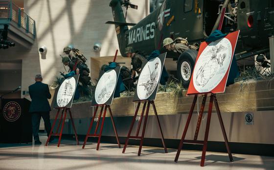 The new trio of commemorative coins dedicated to the 250-year anniversary of the U.S. Marine Corps stand on display after the U.S. Mint unveiling at the National Museum of the Marine Corps, Virginia, July 17, 2024. The coins are a testament to the courage, sacrifice and dedication of all Marines, ensuring that their stories will be remembered and celebrated. (U.S. Marine Corps photo by Lance Cpl. Joaquin Dela Torre)