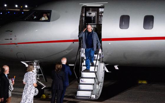 President Joe Biden and Vice President Kamala Harris greet Paul Whelan at Joint Base Andrews in Maryland on Aug. 1, after he was freed from Russian captivity. MUST CREDIT: Demetrius Freeman/The Washington Post