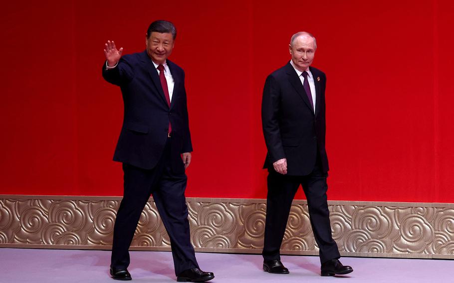 Russia’s President Vladimir Putin and China’s President Xi Jinping attend a concert marking the 75th anniversary of the establishment of diplomatic relations between Russia and China and opening of China-Russia Years of Culture at the National Centre for the Performing Arts in Beijing on May 16, 2024. 