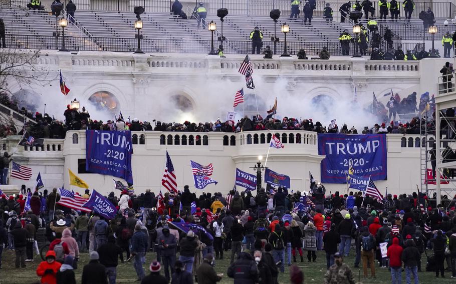 Violent protesters, loyal to President Donald Trump, storm the Capitol, Wednesday, Jan. 6, 2021, in Washington.