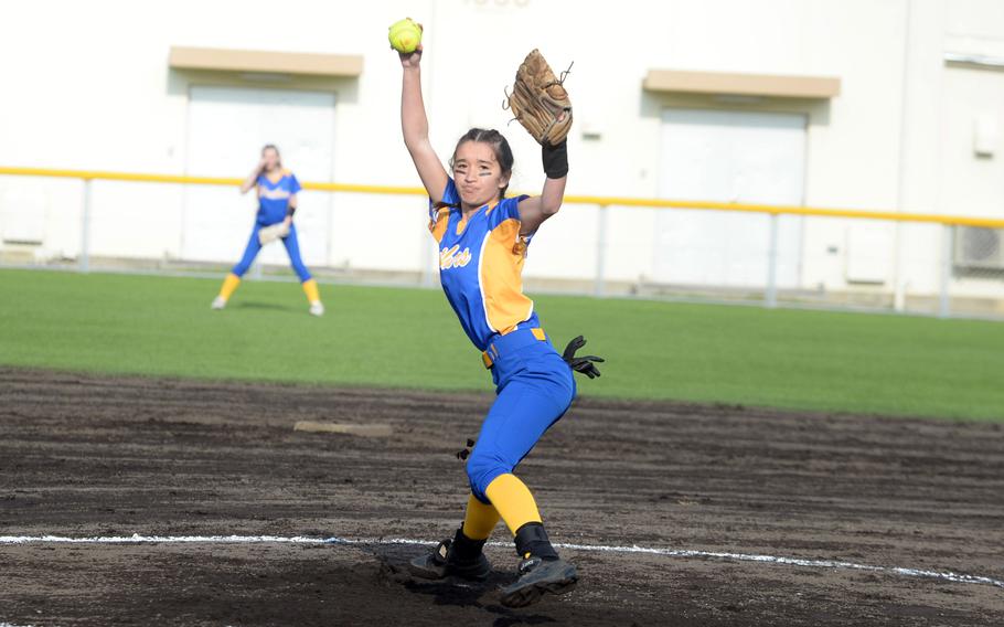 Erica Haas pitches toward the plate.