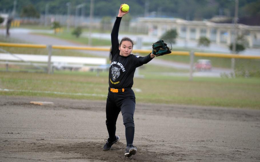 Kadena's Nao Grove delivers against Kubasaki during Friday's Okinawa softball season opener. Grove scattered three hits in a complete-game shutout as the Panthers won 7-0.