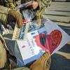 An American soldier holds a Valentine’s Day card.