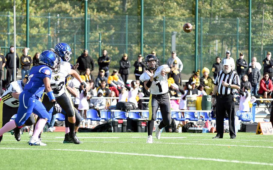 Stuttgart quarterback Ty Jones throws an out route during the first quarter of the Panthers’ Division I semifinal victory against the Royals on Oct. 21, 2023, at Ramstein High School on Ramstein Air Base, Germany. Jones returns for his senior season for the defending champions.