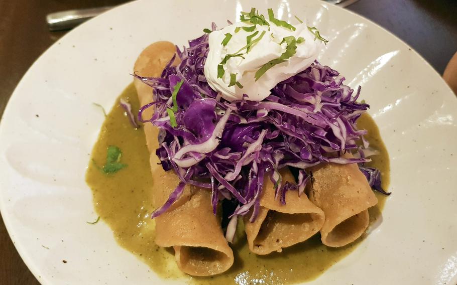 Tacos ahogados from Kuma Cantina, a Mexican restaurant in  Tokyo.