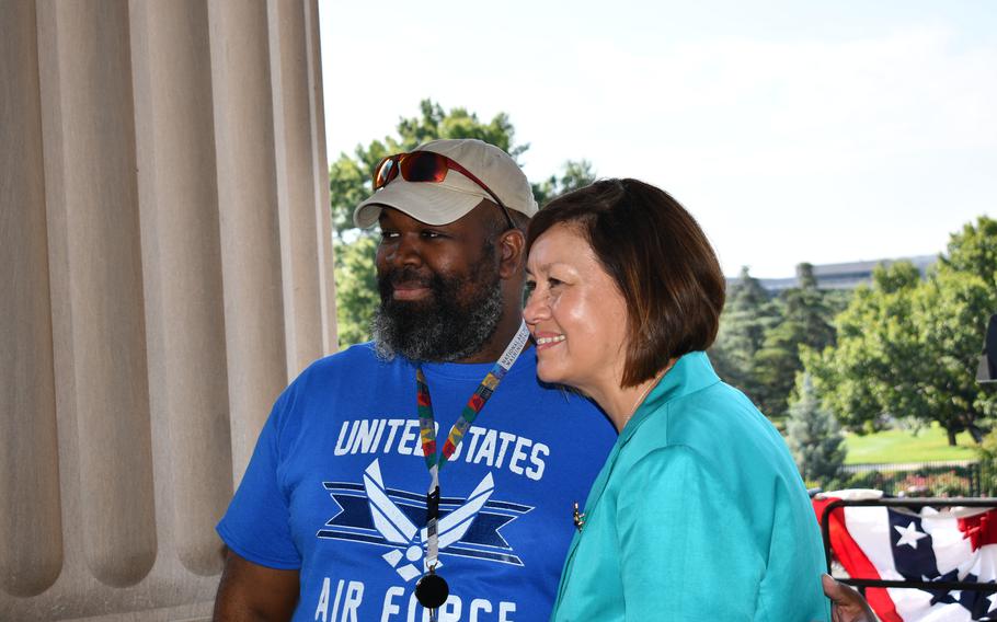 A retired U.S. Airman poses for a photo with retired Chief Master Sergeant JoAnne S. Bass
, 19th Chief Master Sergeant of the Air Force, at the National Archives on July 4, 2024.