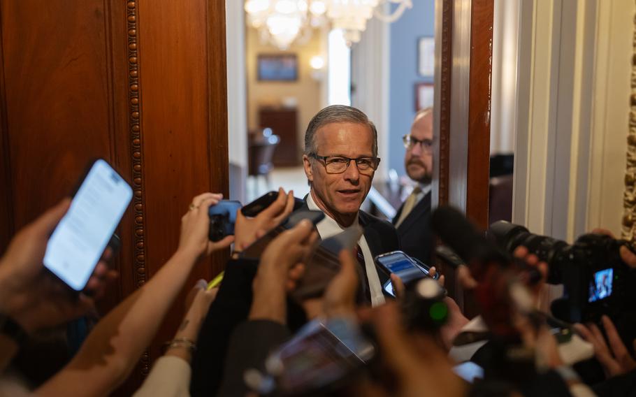 Sen. John Thune, R-S.D., speaks to reporters.