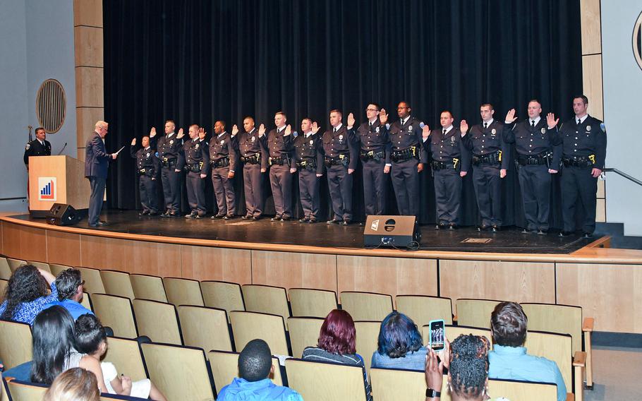 Deandre Holland was one of 14 new police officers sworn in on May 4, 2018, by the Akron Police Department.