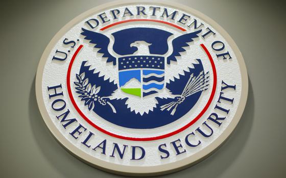 FILE - The Department of Homeland Security logo is seen during a news conference in Washington, Feb. 25, 2015. (AP Photo/Pablo Martinez Monsivais, File)