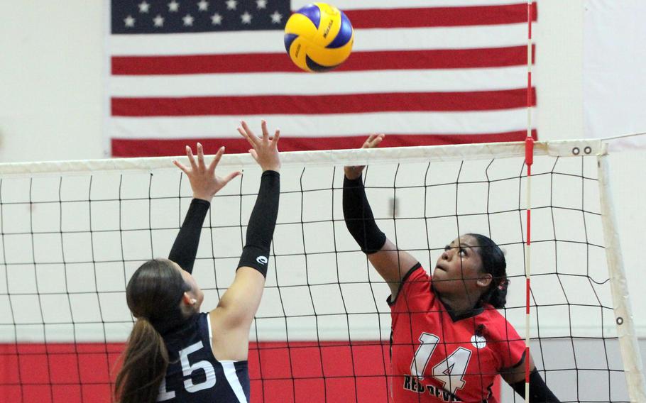 Nile C. Kinnick’s Michele Holloway had 12 kills during Saturday’s Red Devils’ four-set win over Sacred Heart in a Kanto Plain match.