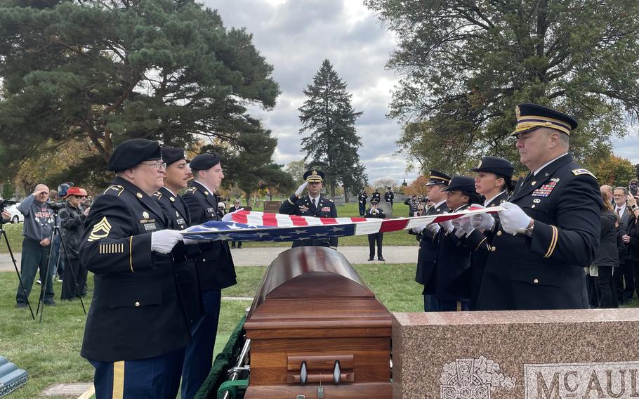 Service members lay 1st Lt. Edward T. McGuire's remains to rest Oct. 28, 2023, some 80 years after he died in World War II.