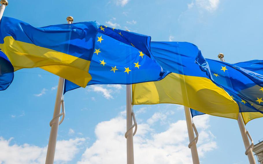 E.U. and Ukrainian flags