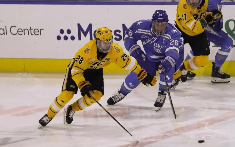 Air Force men’s hockey players battle against league foes AIC, Oct. 25, 2024.