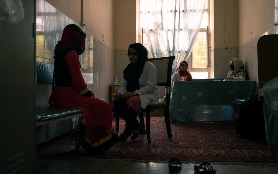 A young woman attends a counseling session at the hospital in Herat.