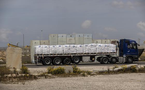 A truck loaded with humanitarian aid for Gaza arrives at the Kerem Shalom border crossing in March