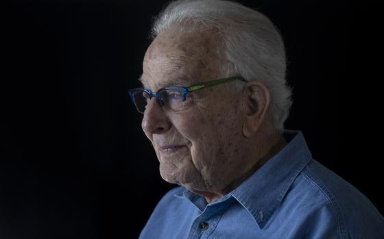 Holocaust survivor Naftali Fürst pauses during an interview at home in Haifa, Israel, Tuesday, Jan. 14, 2025. (AP Photo/Maya Alleruzzo)