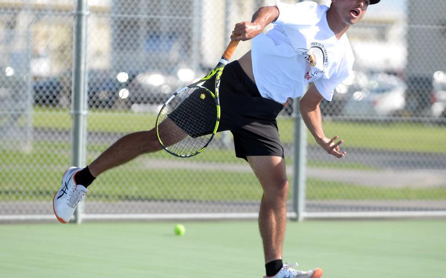 Ryunosuke Roesch hits the ball.