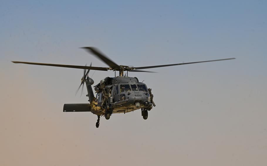 A U.S. Air Force Pave Hawk trains with air crew members assigned to the 11th Expeditionary Combat Aviation Brigade on July 6, 2022 at an undisclosed location. A commander from the brigade took actions that constituted reprisal after blocking a soldier’s deployment and reducing her pay, following a sexual assault complaint that she made.