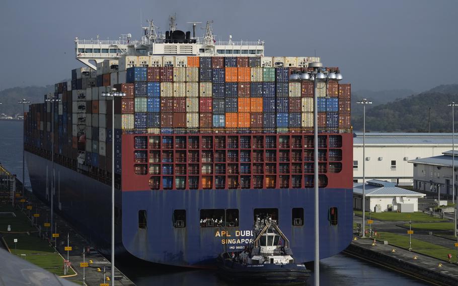 A cargo ship goes through the Panama Canal’s Cocoli locks in Panama City, Friday, Feb. 21, 2025. 