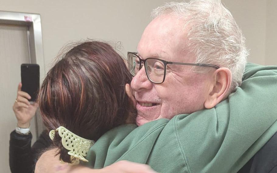 Rimon Kirsht Buchshtav embraces her father, Nahum Kirsht, in Tel Aviv after her release late last month.