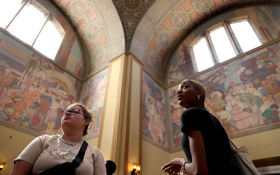 Lexa Smith of Warren, N.H. left, and Anna Gordon of Jackson, Miss., both 18, learn about Los Angeles Central Library during a tour of downtown Los Angeles as part of the American Exchange Project on July 19. 