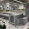 The Stuttgart main station, with its iconic Mercedes Benz symbol atop it, is the primary feature of the Miniature World Stuttgart museum's collection of models re-creating the 1980s look of the German city. 