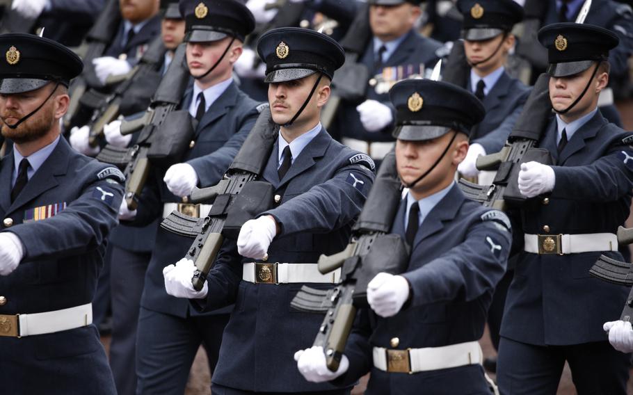 Soldiers march in a procession 