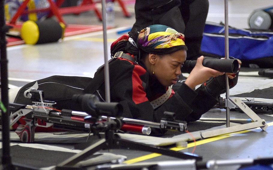 Kaiserslautern's Maurnice Avahit adjusts her sight during a marksmanship competition on Jan. 6, 2024, at Kaiserslautern High School in Kaiserslautern, Germany.