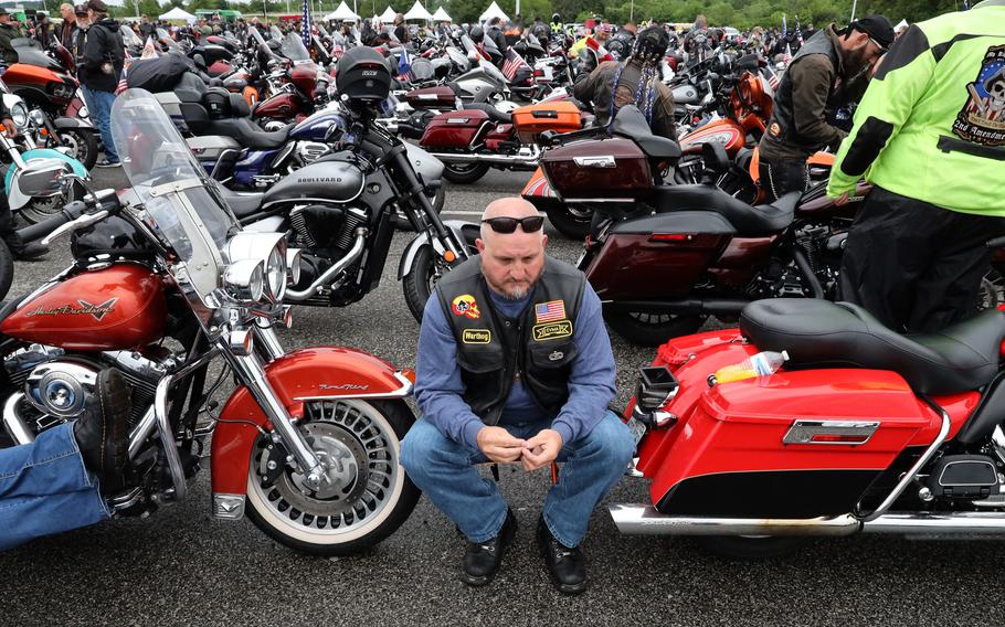 A participant in the Rolling to Remember ride awaits the signal to start at the RFK Stadium staging area, May 30, 2021 in Washington, D.C..