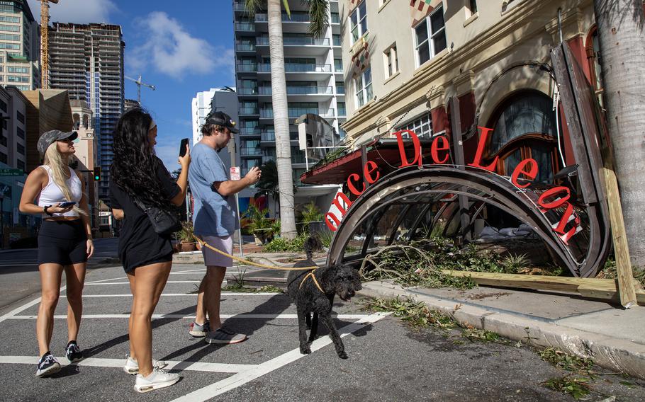 People check out damage from Hurricane Milton