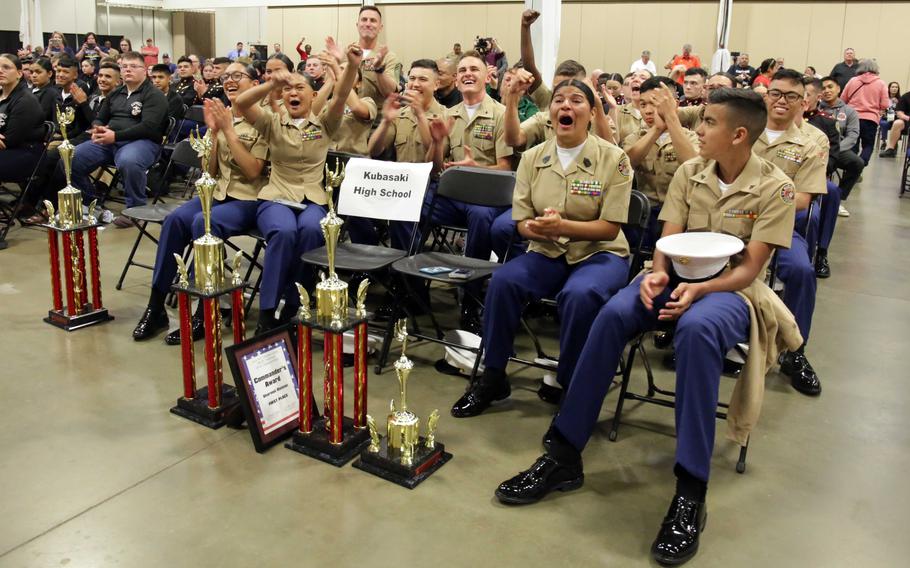 Dragon Battalion members react after being announced the overall winners of the national MCJROTC drill competition April 12, 2023, at the Expo Center, Fredericksburg, Va. It was the first of their two consecutive national titles.
