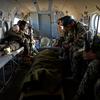 Over Afghanistan, Jan. 6, 2015: Afghan National Army soldiers rest in the back of an Mi-17 helicopter after being evacuated from a remote outpost in southern Afghanistan. As coalition air support has dwindled to almost nothing, the few Afghan Air Force helicopters are in high demand.

On Jan.1, 2015 the NATO-led coalition transitioned to a mission focused more on advising and training than combat operations, but for hundreds of thousands of Afghan security forces and their remaining foreign advisers, the fighting is far from over.

While embedded with the Afghan soldiers and air crews continuing that fight across what was once the Taliban heartland, Stars and Stripes gained an exclusive look at what the war looks like after the withdrawal of most international forces.

Read the story here. https://www.stripes.com/theaters/middle_east/the-war-we-leave-behind-afghan-forces-continue-fight-1.324603

META TAGS: Operation Enduring Freedom; Afghanistan; Wars on Terror; casualties; Afghan National Army; Afghan National Air Force; 