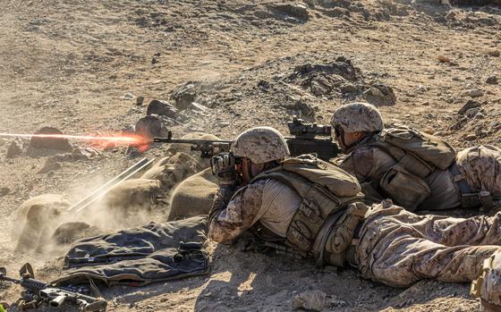 Marines fire an M240B machine gun at Marine Corps Air-Ground Combat Center, Twentynine Palms, California, Sept. 12, 2023. Four service members received awards for aiding a severely injured Marine during live-fire training at Twentynine Palms in July 2024, the service said.