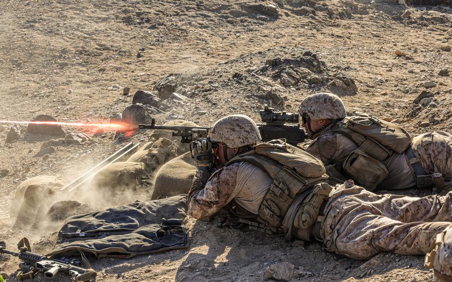 Marines fire an M240B machine gun at Marine Corps Air-Ground Combat Center, Twentynine Palms, California.