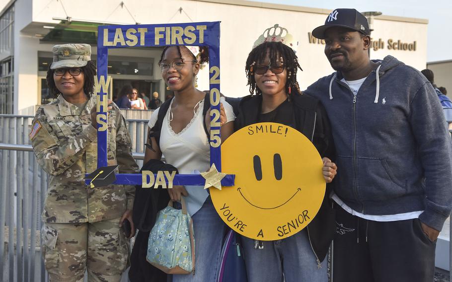 The Adams family celebrate the beginning of senior year for twins Dalal and Dilshad Adams at Wiesbaden High School, Germany, on Aug. 19, 2024. 