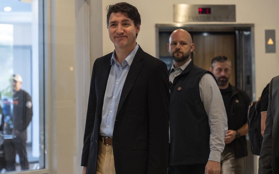 Canada Prime Minister Justin Trudeau walks through the lobby of the Delta Hotel by Marriott, Saturday, Nov. 30, 2024, in West Palm Beach, Fla. 