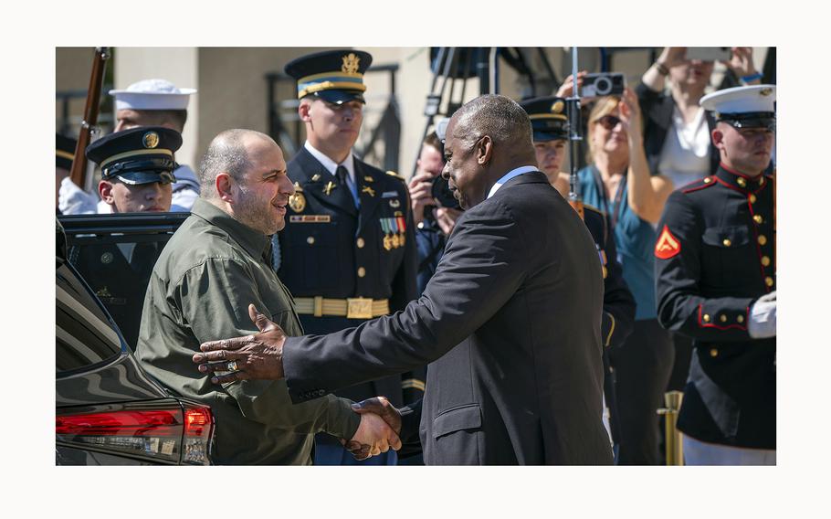 Defense Secretary Lloyd Austin, right, greets Ukraine’s Defense Minister Rustem Umerov during an arrival ceremony at the Pentagon, Tuesday, July 2, 2024, in Washington.