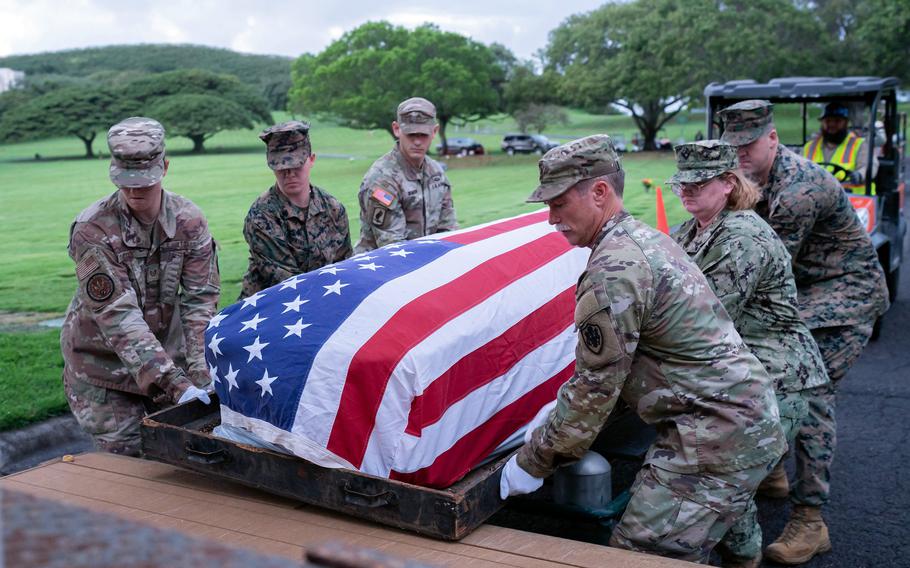 U.S. service members assigned to the Defense POW/MIA Accounting Agency carry out a disinterment ceremony at the National Memorial Cemetery of the Pacific in Honolulu, Hawaii, Jan. 29, 2023. 