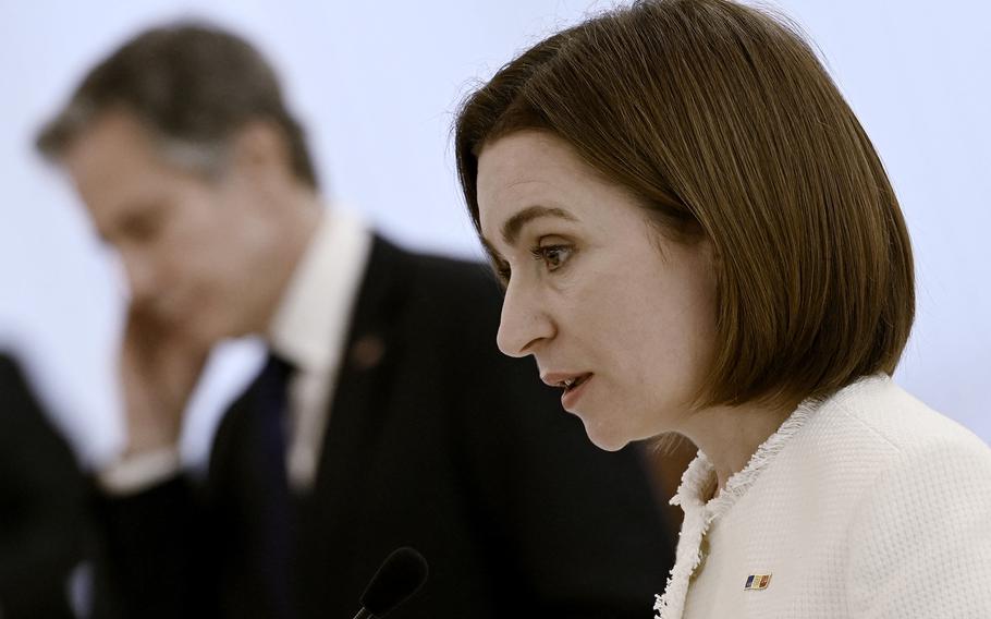 Moldova President Maia Sandu and resident Maia Sandu, right, speaks next to U.S. Secretary of State Antony Blinken.