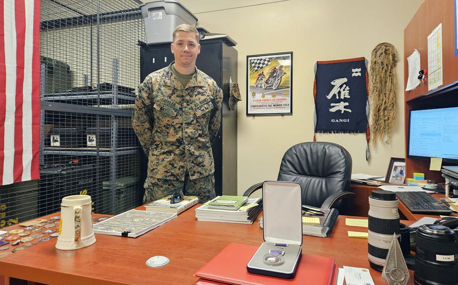 Marine receives an award after his time in Afghanistan.