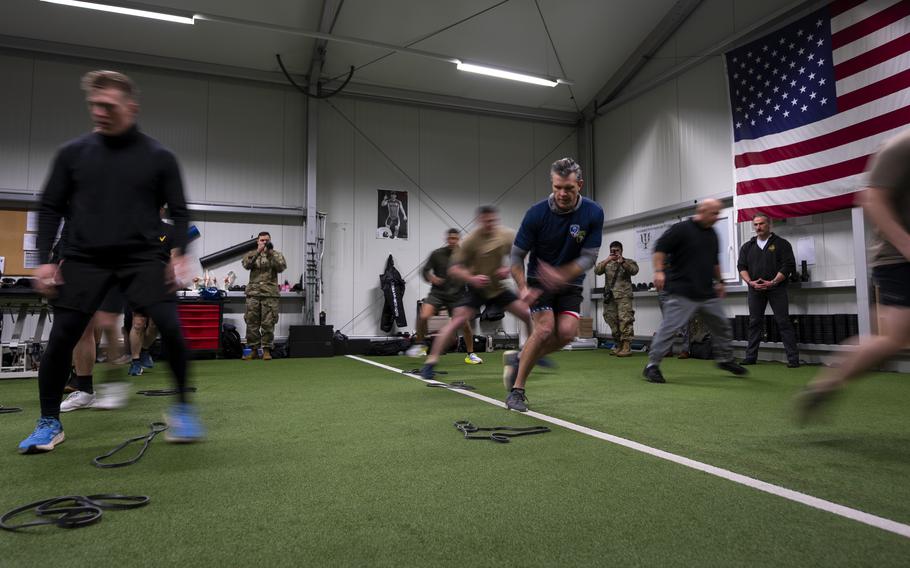 Secretary of Defense Pete Hegseth participates in a morning PT session hosted by troops