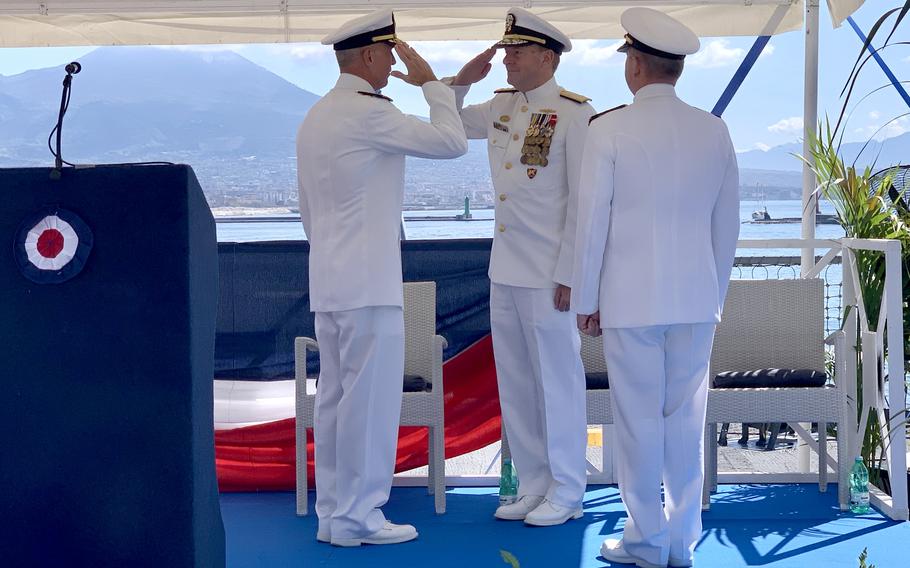 Vice Admiral Jeffrey Anderson (left) salutes Admiral Stuart Munsch, commander of U.S. Naval Forces Europe-Africa and Allied Joint Forces Command in Naples, during a change of command ceremony.